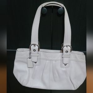 Ivory coach purse
